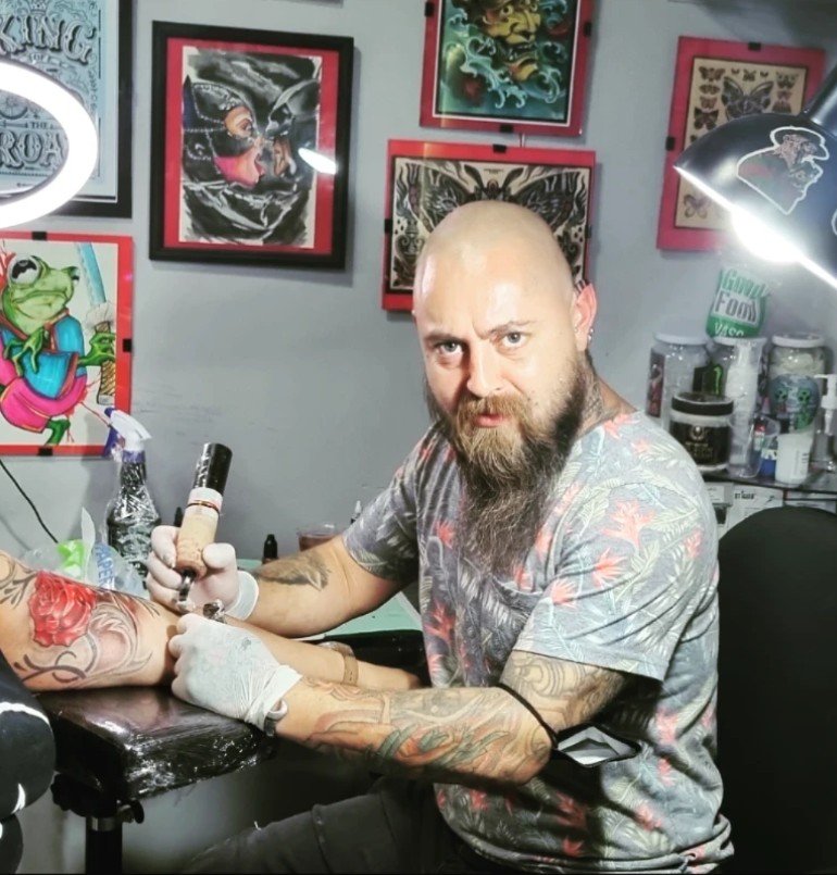 Jaime Miranda Reyes tattooing in his studio