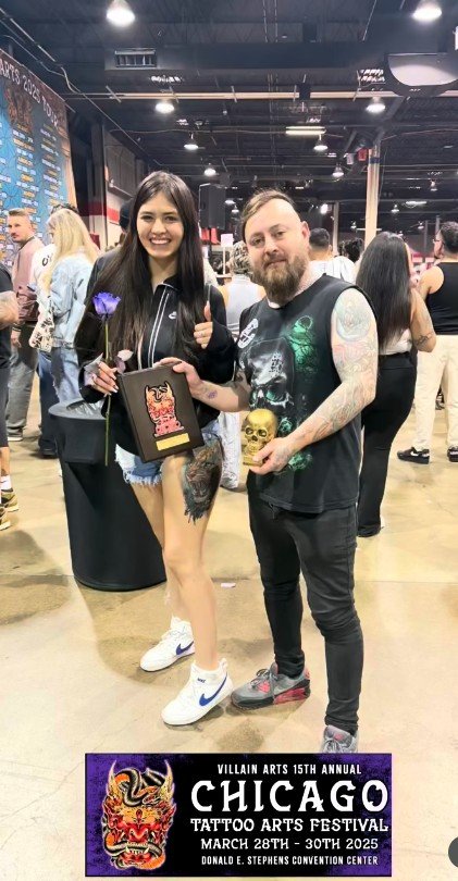 Jaime Miranda Reyes with his award at the Chicago Tattoo Arts Festival 2025